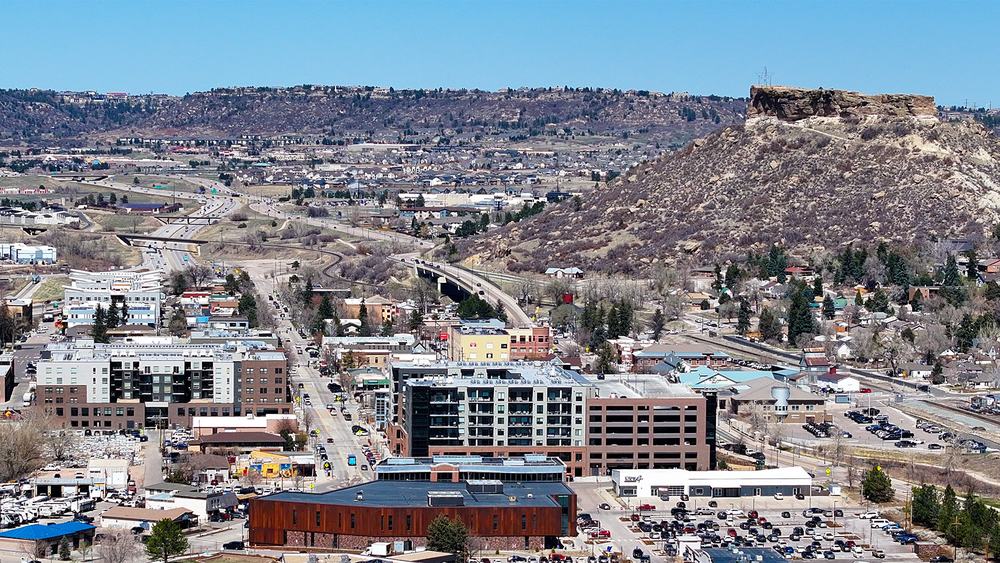 Downtown Castle Rock, Colorado, with the Rock butte rising above the town